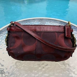 Small burgundy Coach bag